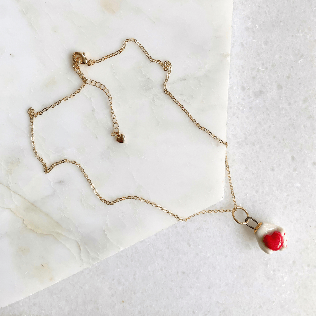 Ceramic Heart in Hand Pendant Necklace