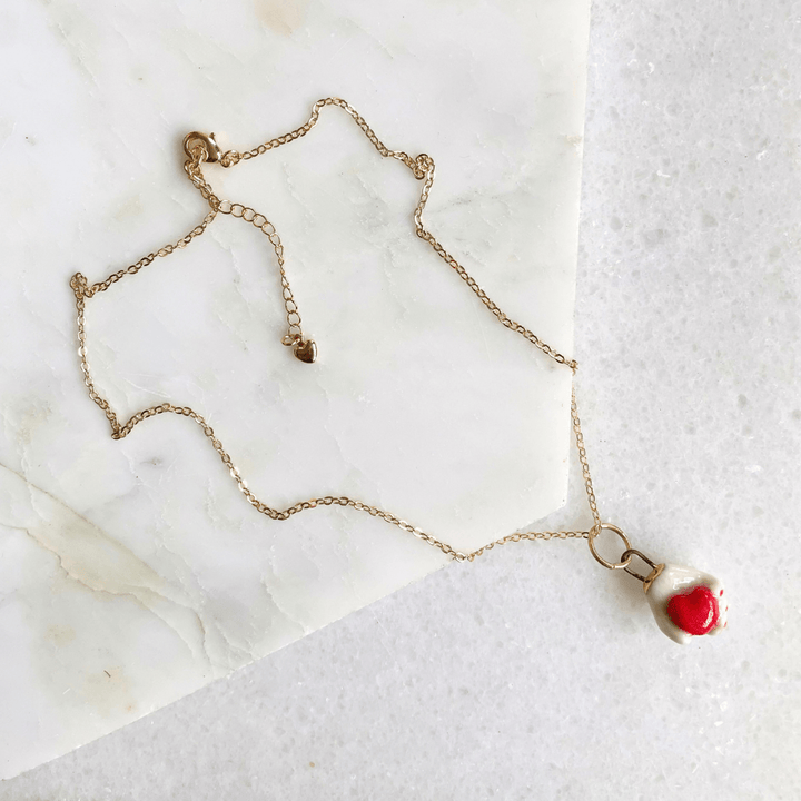 Ceramic Heart in Hand Pendant Necklace
