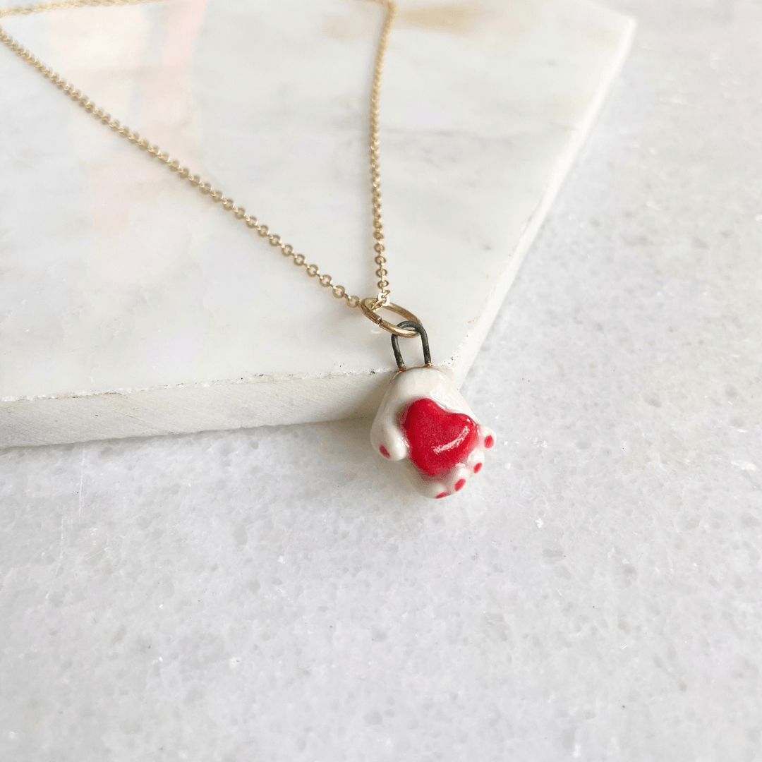 Ceramic Heart in Hand Pendant Necklace