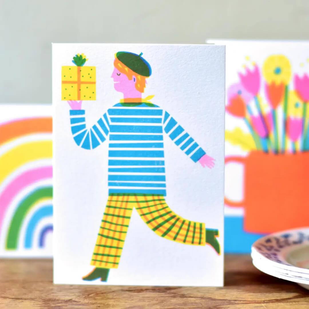 Man with Gift Greetings Card