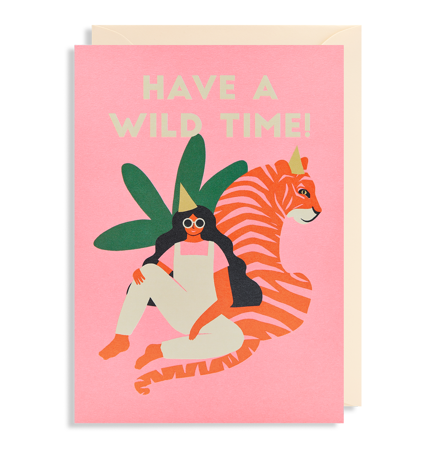 Naomi Wilkinson pink greetings card featuring illustration of a female in dungarees and a party hat sitting next to a tiger and the words 'Have A Wild Time!'.