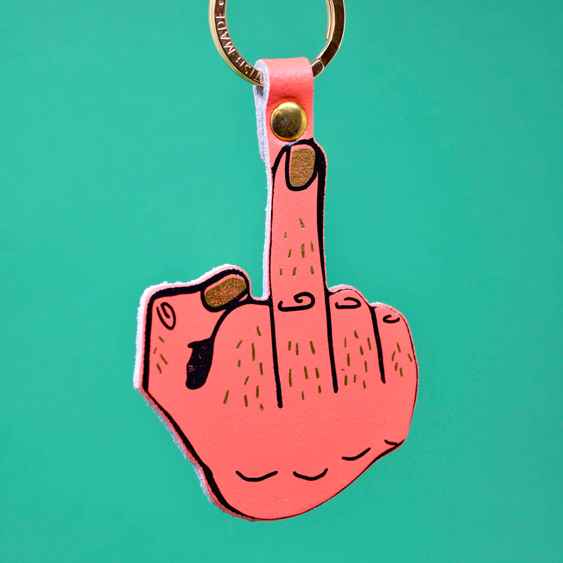 Cheeky genuine leather key ring by Ark Colour Design featuring a pink hand making the middle finger swear sign.